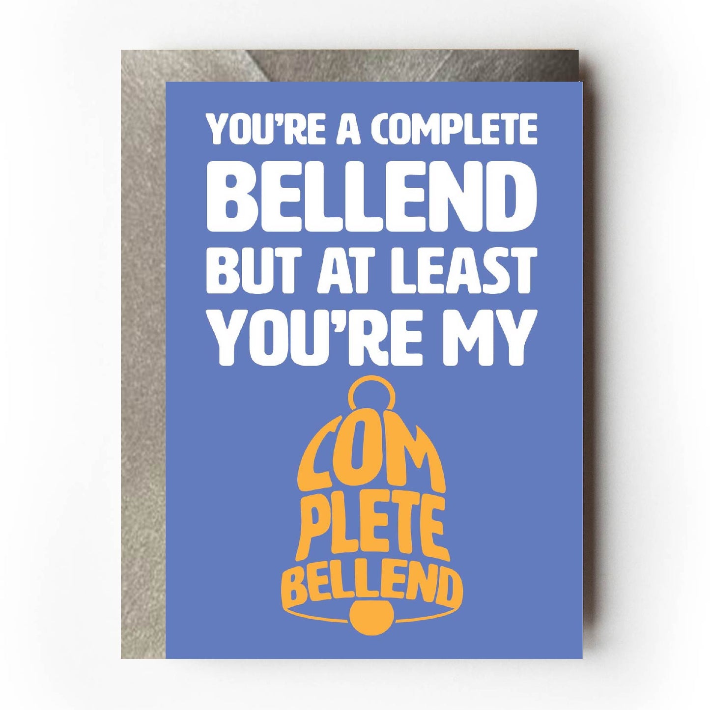 Text on card is white and yellow against a light blue background and states "You're a complete bellend but at least you're my complete bellend" Card measures 105 x 150mm and is supplied with a very striking pewter-effect eco-Kraft envelope.