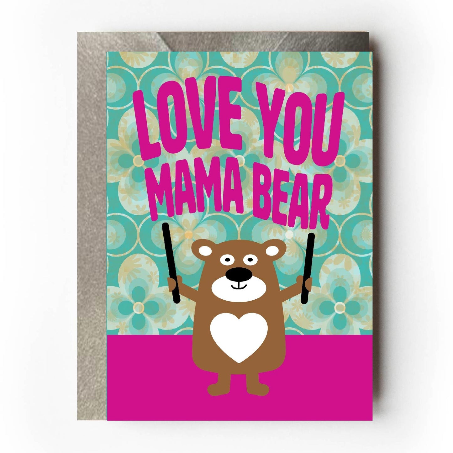 Greeting card with 'Love You Mama Bear' text and bear illustration on a patterned background. Perfect for Mother's Day or mum's birthday