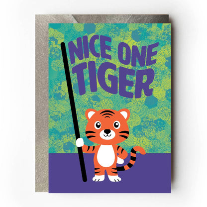 Greeting card with a cartoon tiger holding a flag stating 'Nice One Tiger' on a colourful background