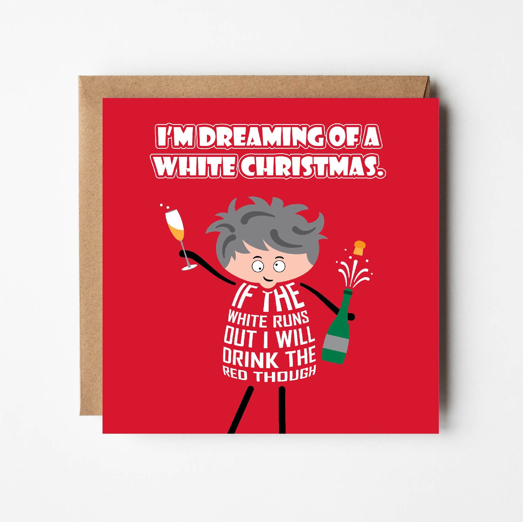 Card titled Dreaming of a White Christmas in white text on red background. A cartoon lady holds up a glass of bubbly in one hand and a bottle of fizz in the other. She says If the white runs out I will drink the red though.  Card is 150mm square with eco-Kraft envelope. 