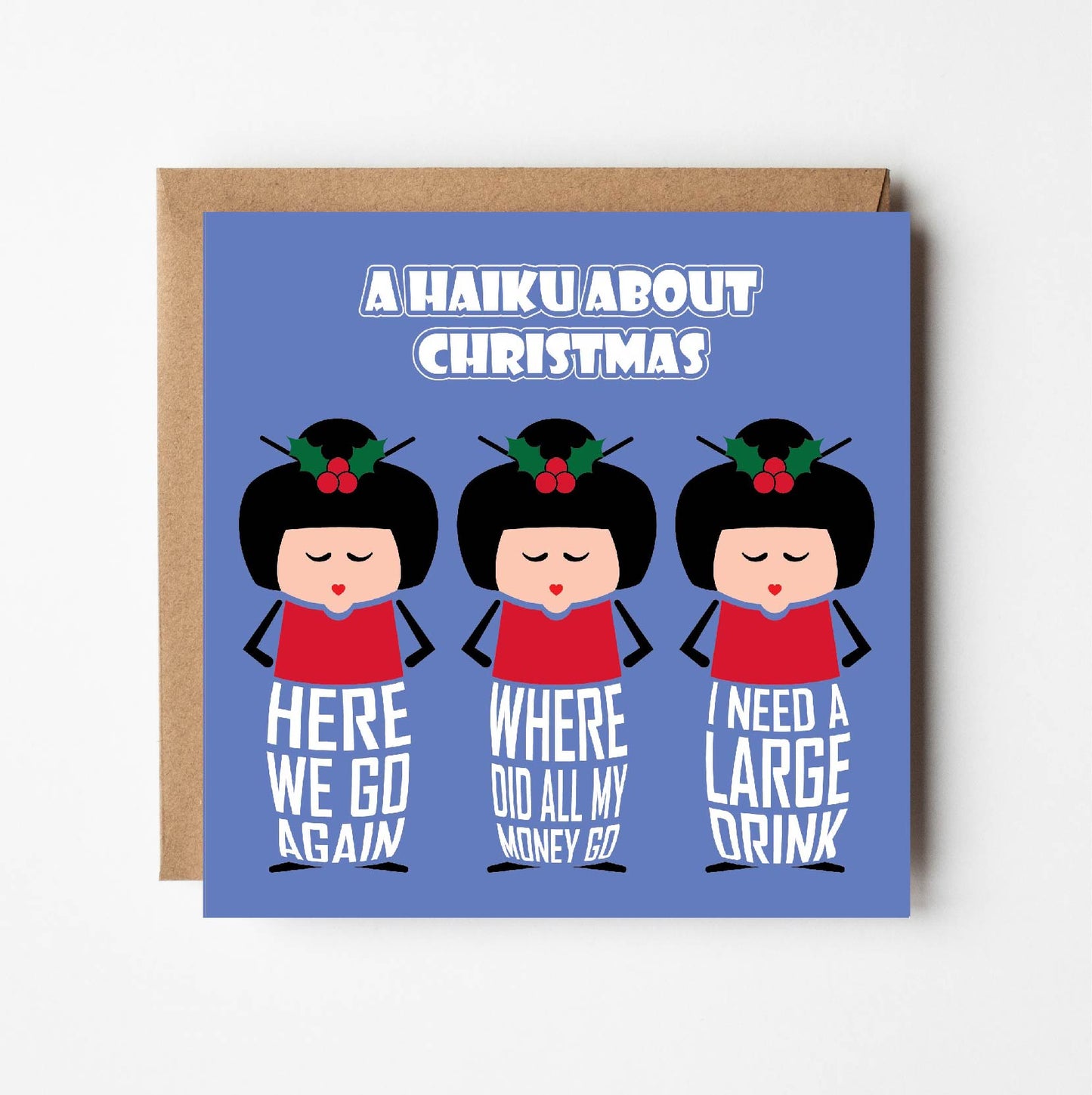 Card titled Haiku About Christmas in white text on purple background.  Adopting the rules of Haiku, three cartoon Japanese ladies then convey three lines saying: Here we go again.  Where did all my money go? I need a large drink.
