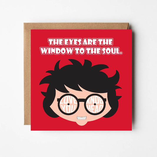 Card titled The Eyes are the Window to the Soul in white text on red background.  Close up of cartoon head which is grinning and wearing round glasses.  Text forms the lens of the glasses which says Love you, Knobhead.  Card is 150mm square and supplied with eco-Kraft envelope.