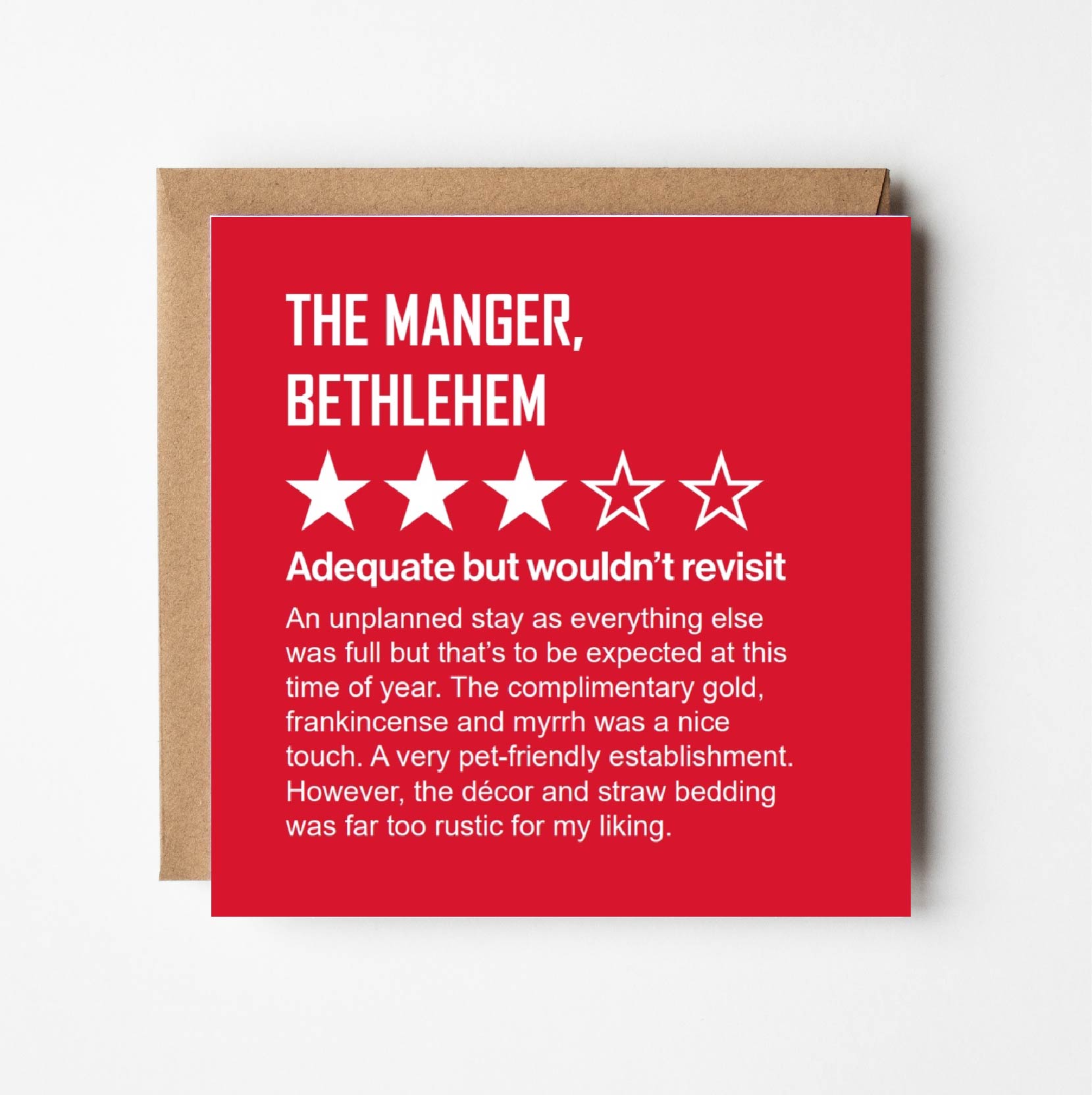 In style of online review, Mary describes her stay in the manger.  White text on red background. Mary awards 3 out of 5 stars stating that it was "An unplanned stay as everything else was full but that's to be expected at this time of year.  The complimentary gold, frankincense and myrrh was a nice touch. A very pet-friendly establishment. However, the decor and straw bedding was far too rustic for my liking." 